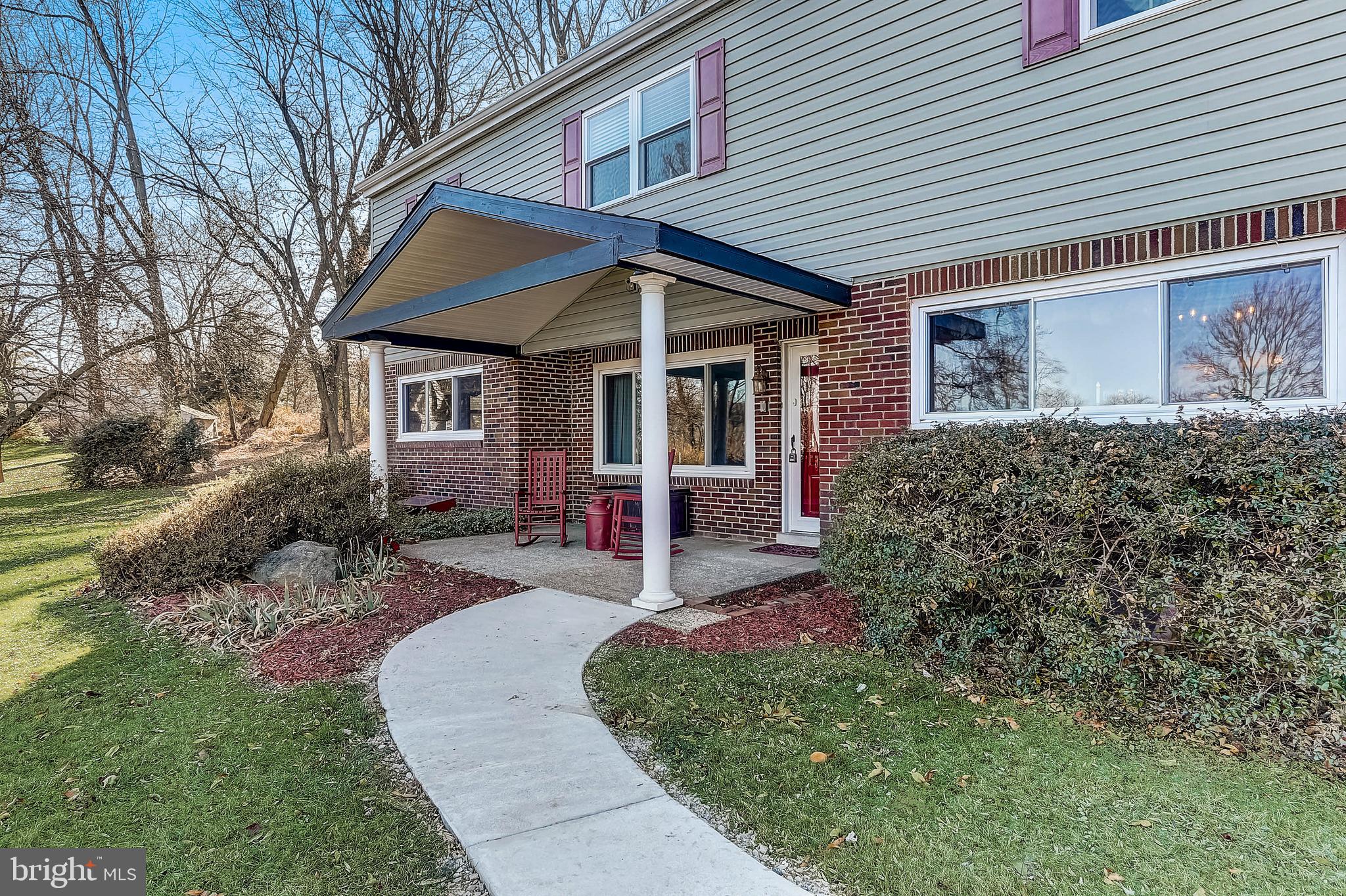 100 Diamond Rock Road Phoenixville, PA 19460 - Photo 6 of 49 Charming covered porch leads to front door