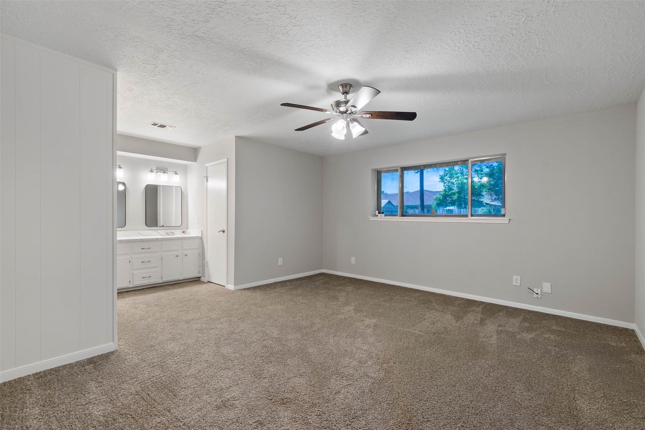 4302 Seneca Street Pasadena, TX 77504 - Photo 7 of 19 a view of an empty room with a window
