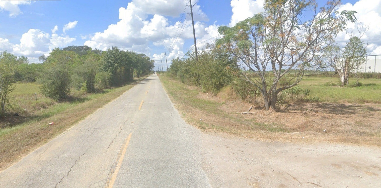 0 Burton Cemetery Road Waller, TX 77484 - Photo 6 of 10 a view of a yard with large trees