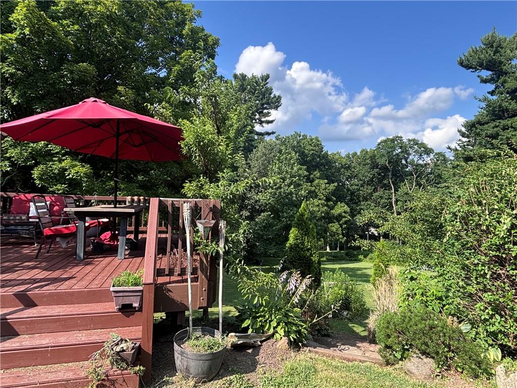 257 Johnston Road Pittsburgh, PA 15241 - Photo 21 of 29 a view of a patio with chairs under an umbrella