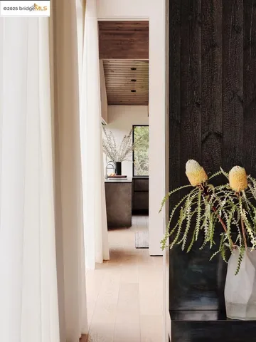 a view of a dining room with furniture and window