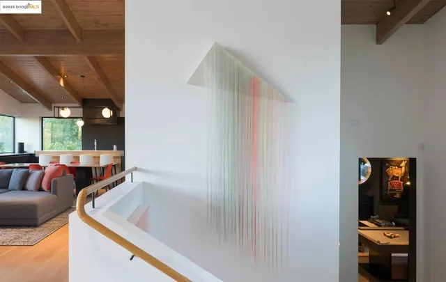 a outdoor space with patio fireplace and potted plants