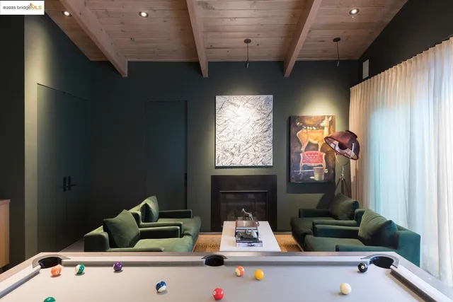 a bathroom with a potted plant and a sink