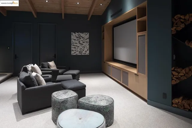 a large white kitchen with a large window