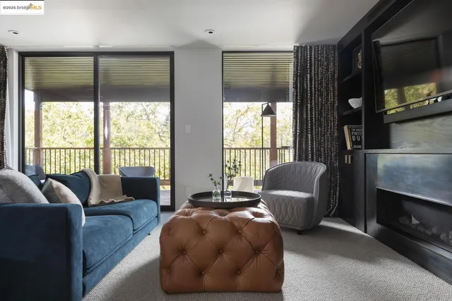 a view of balcony with furniture