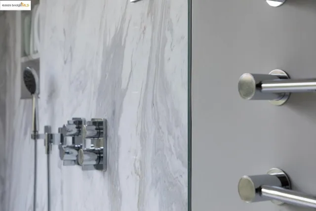 a bathroom with a sink mirror vanity and toilet