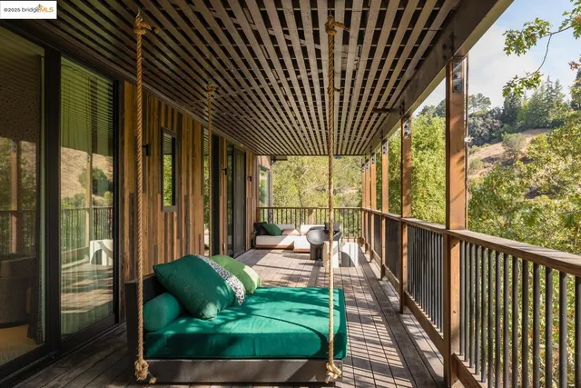 a bedroom with a bed and a tv