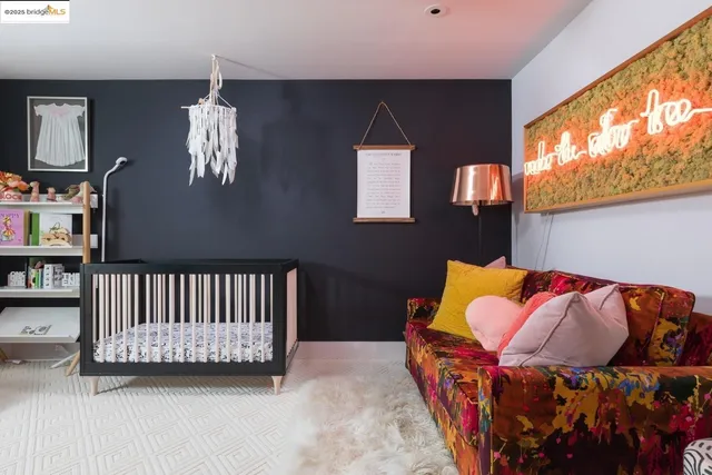 a kitchen with a table chairs and a sink