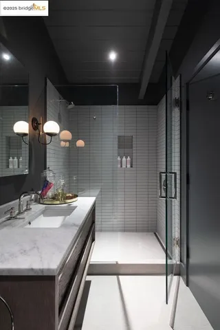 a view of a porch with furniture and backyard