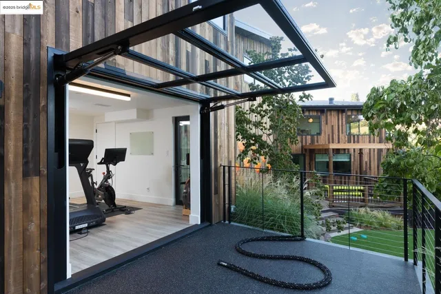a front view of a house with yard porch and furniture