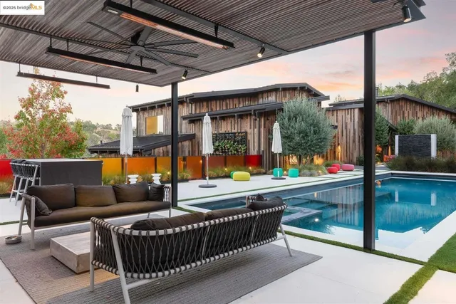 a living room with a couch and fireplace