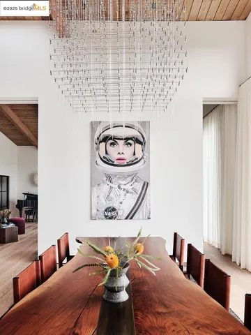 a bedroom with a bed and wall painting