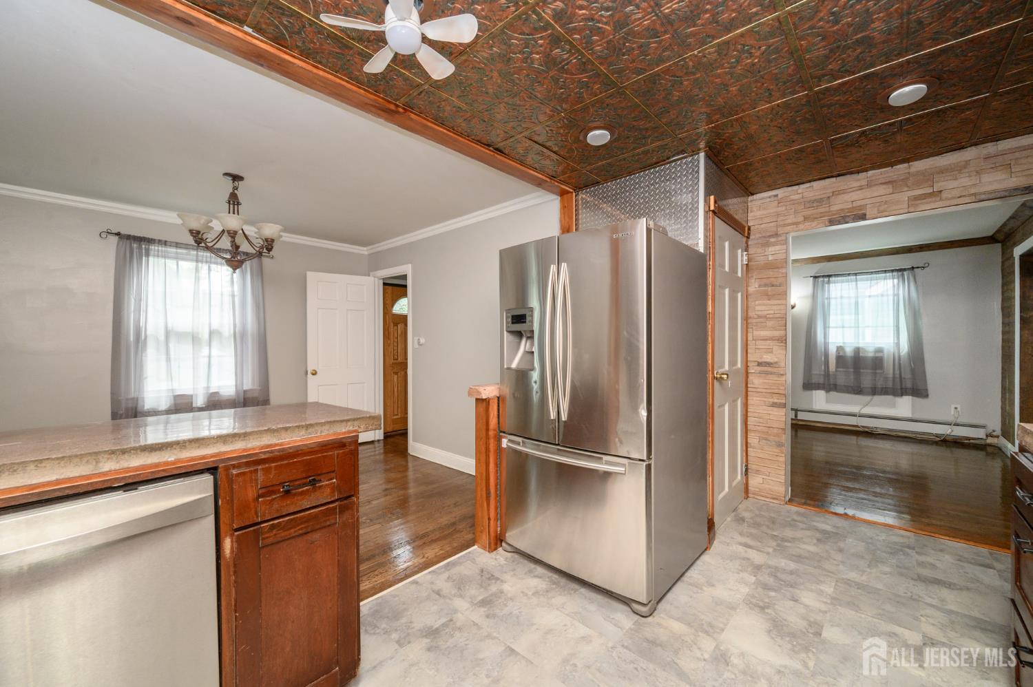 212 Echo Avenue Edison, NJ 08837 - Photo 14 of 42 a kitchen with stainless steel appliances a refrigerator and a sink
