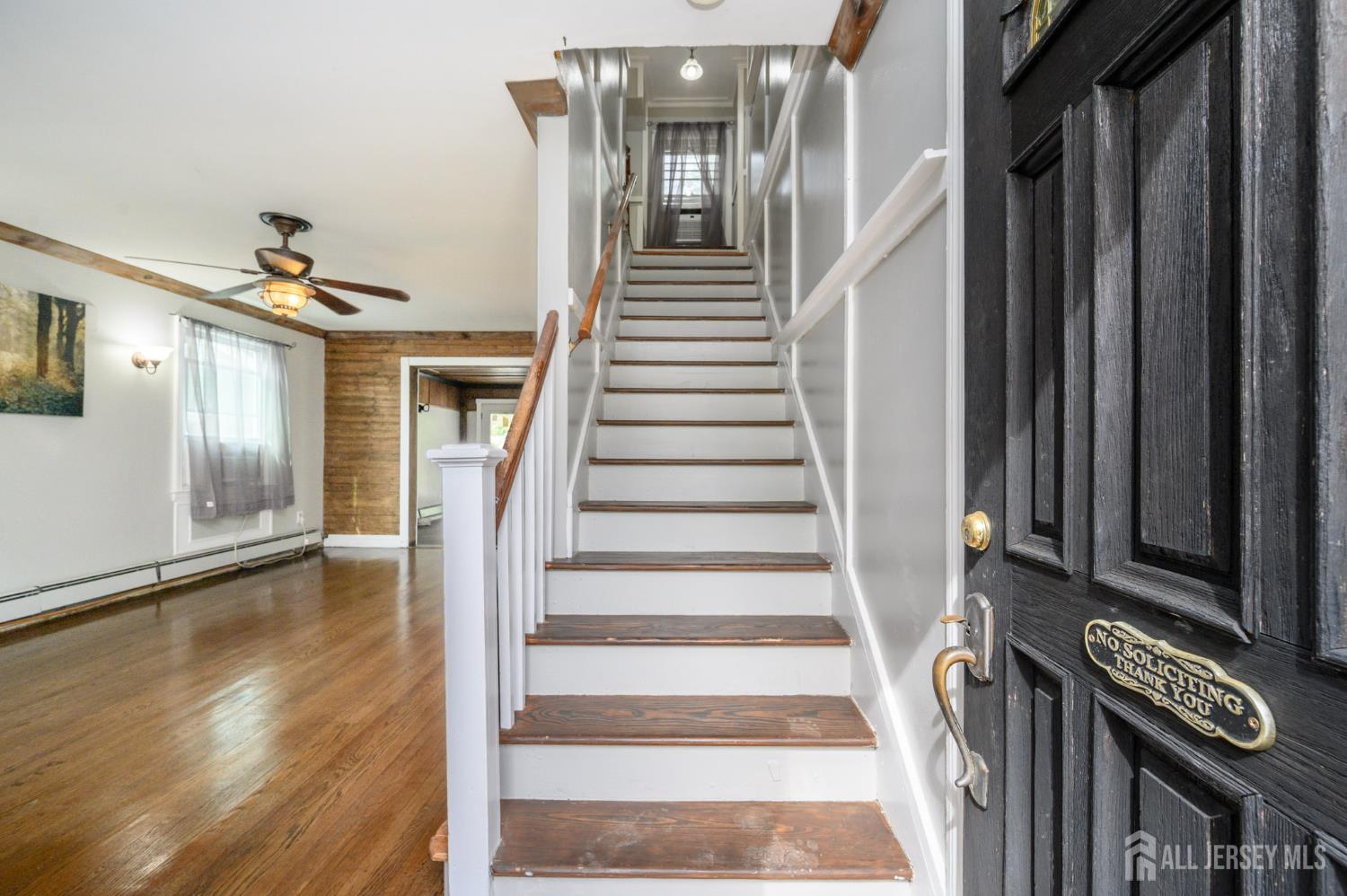 212 Echo Avenue Edison, NJ 08837 - Photo 2 of 42 a view of an entryway with wooden floor