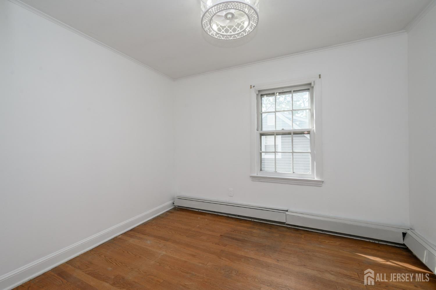 212 Echo Avenue Edison, NJ 08837 - Photo 24 of 42 an empty room with a window
