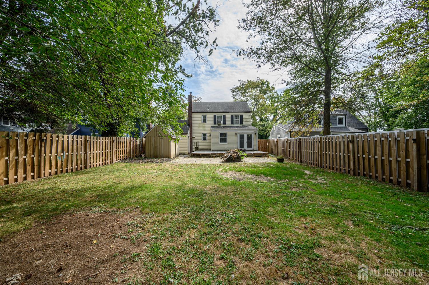 212 Echo Avenue Edison, NJ 08837 - Photo 38 of 42 a view of a house with backyard and a tree