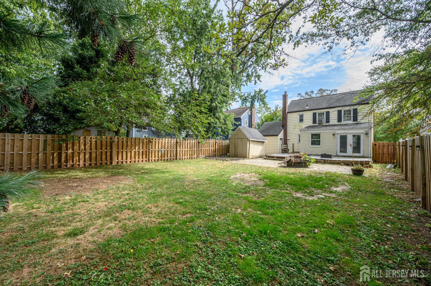 212 Echo Avenue Edison, NJ 08837 - Photo 39 of 42 a view of a house with yard and a tree