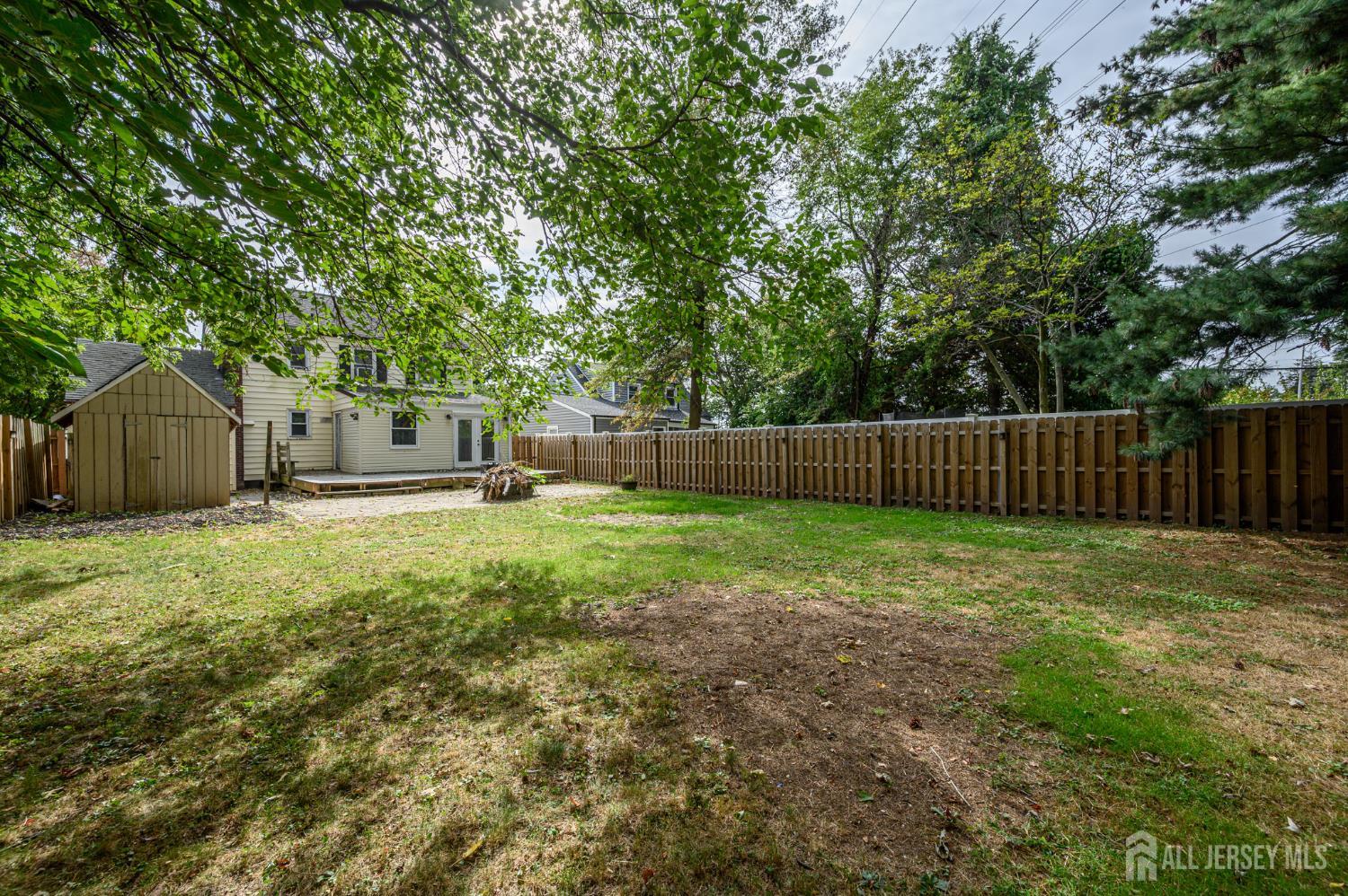 212 Echo Avenue Edison, NJ 08837 - Photo 40 of 42 a backyard of a house with lots of green space