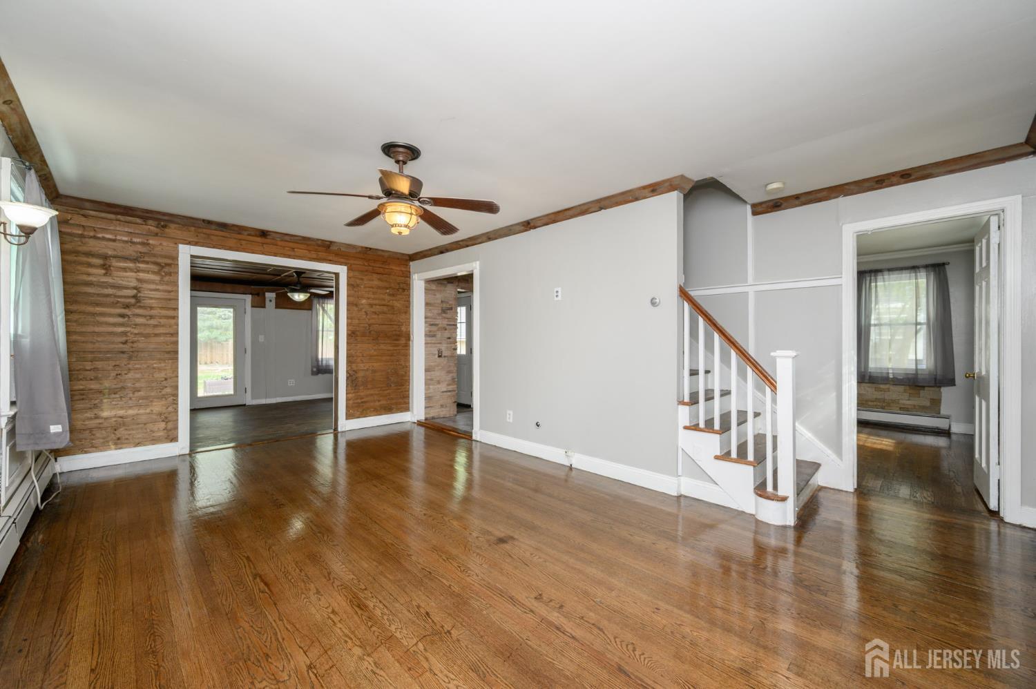 212 Echo Avenue Edison, NJ 08837 - Photo 4 of 42 a view of an entryway with wooden floor