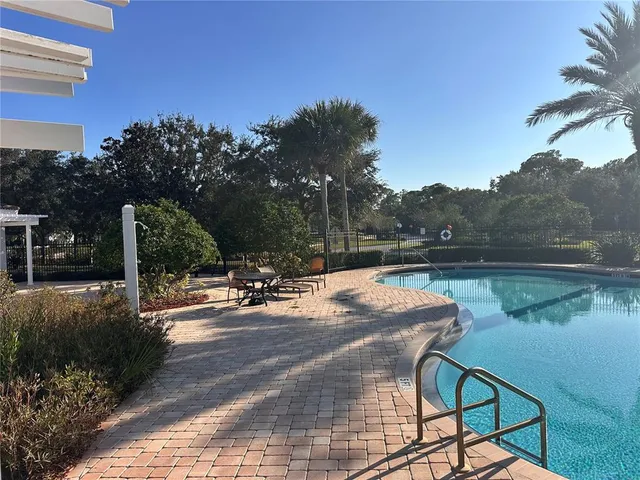 a view of a lake with a patio