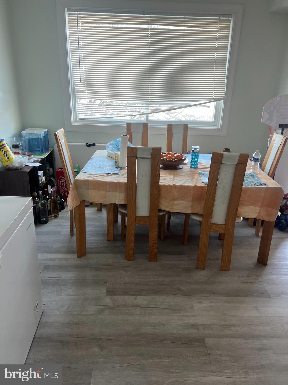1836 Metzerott Road, Unit 422 Hyattsville, MD 20783 - Photo 6 of 12 a dining room with furniture and window
