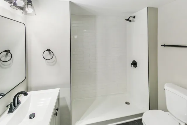 a bathroom with a sink and a shower