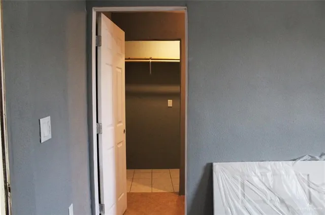a storage room with washer and dryer
