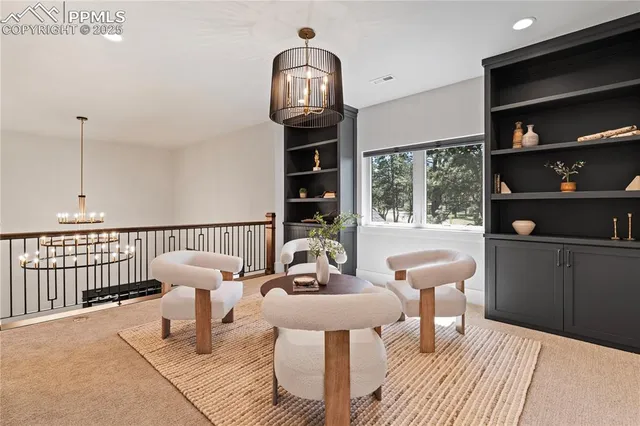 a view of a chairs in a room