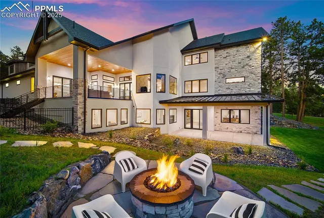 a view of a mountain with sunset view