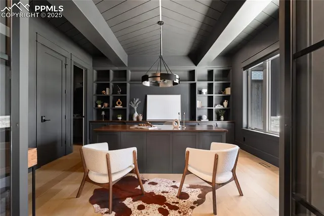 a dining room with furniture and window