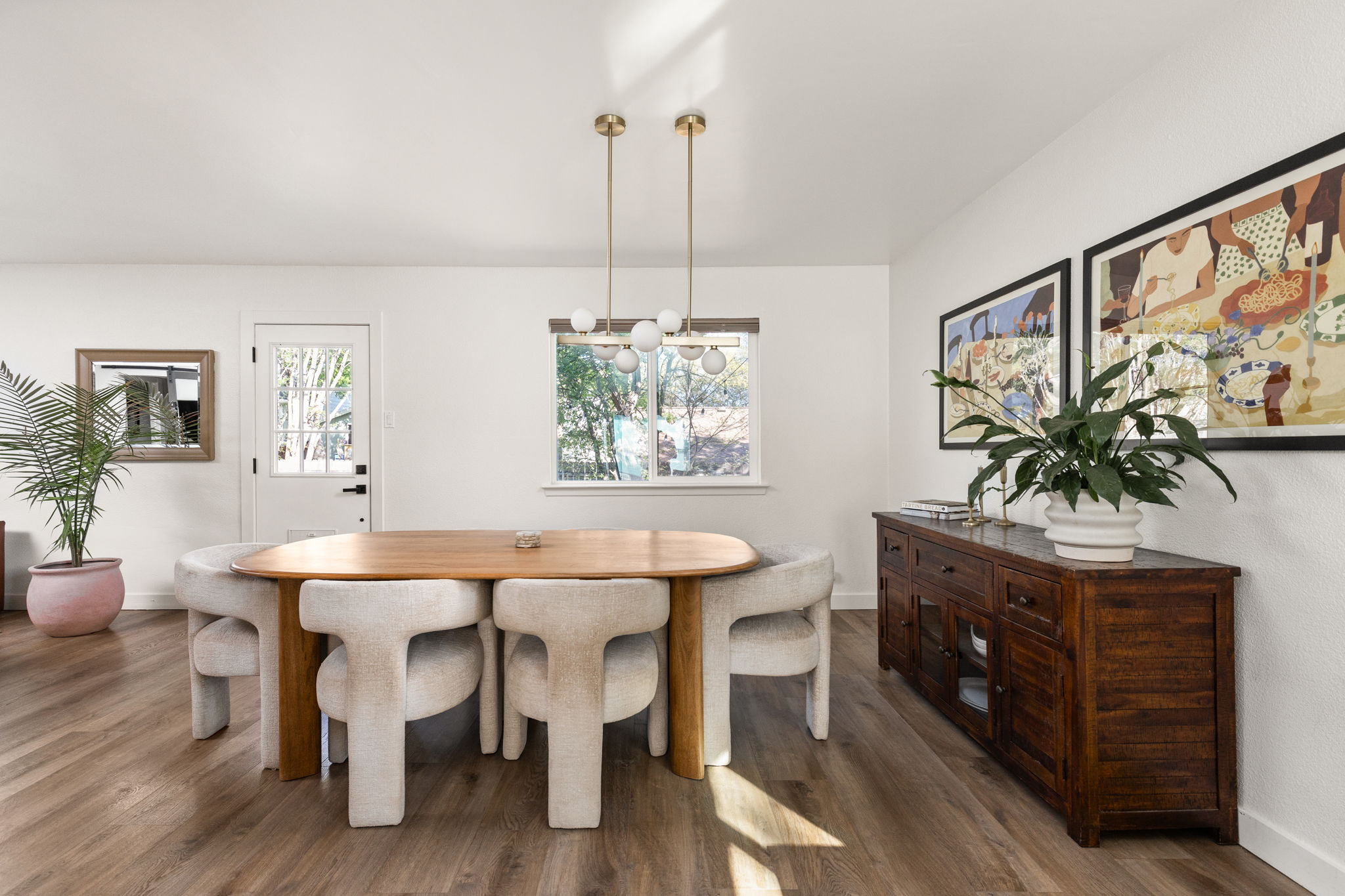 7909 Manassas Drive Austin, TX 78745 - Photo 20 of 37 Dining room featuring dark wood-type flooring and baseboards