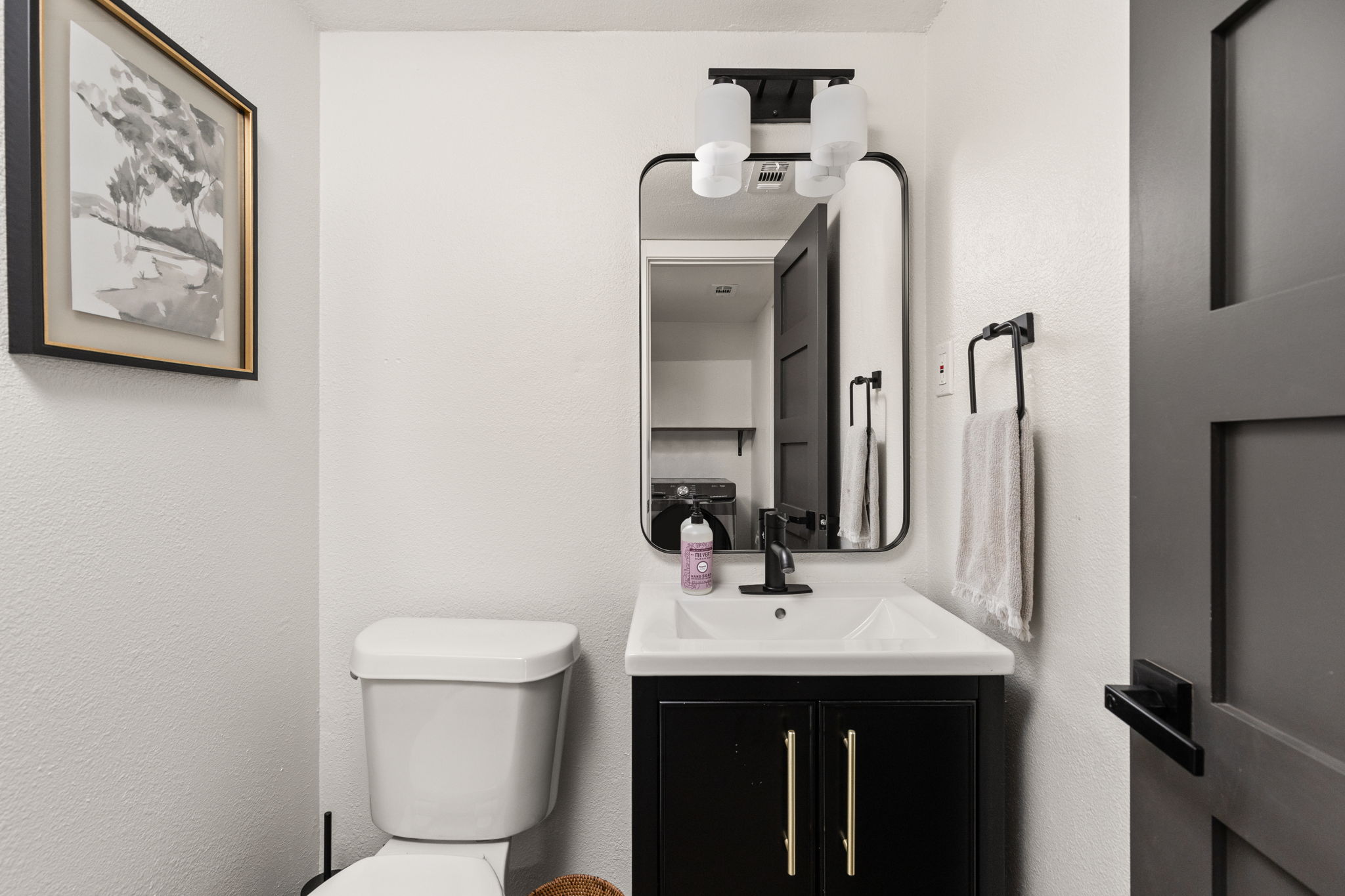 7909 Manassas Drive Austin, TX 78745 - Photo 25 of 37 Bathroom featuring vanity and toilet