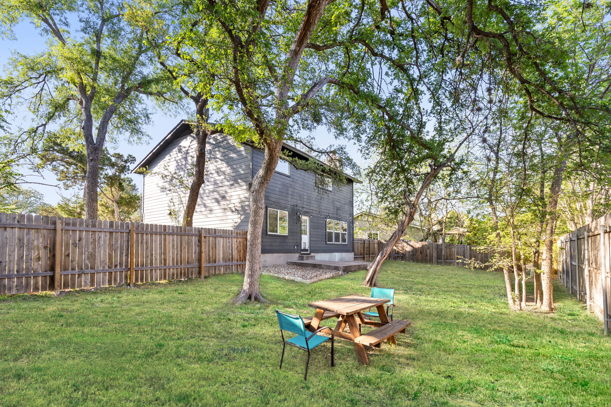 7909 Manassas Drive Austin, TX 78745 - Photo 37 of 37 Fenced backyard featuring a patio
