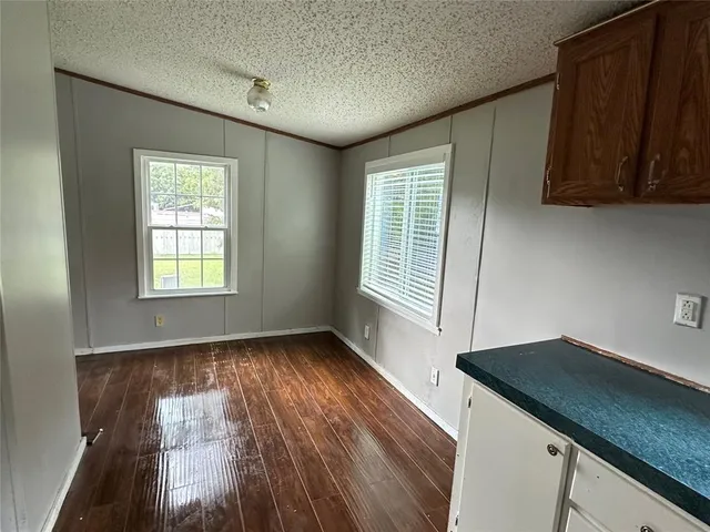 a sink sitting next to a window
