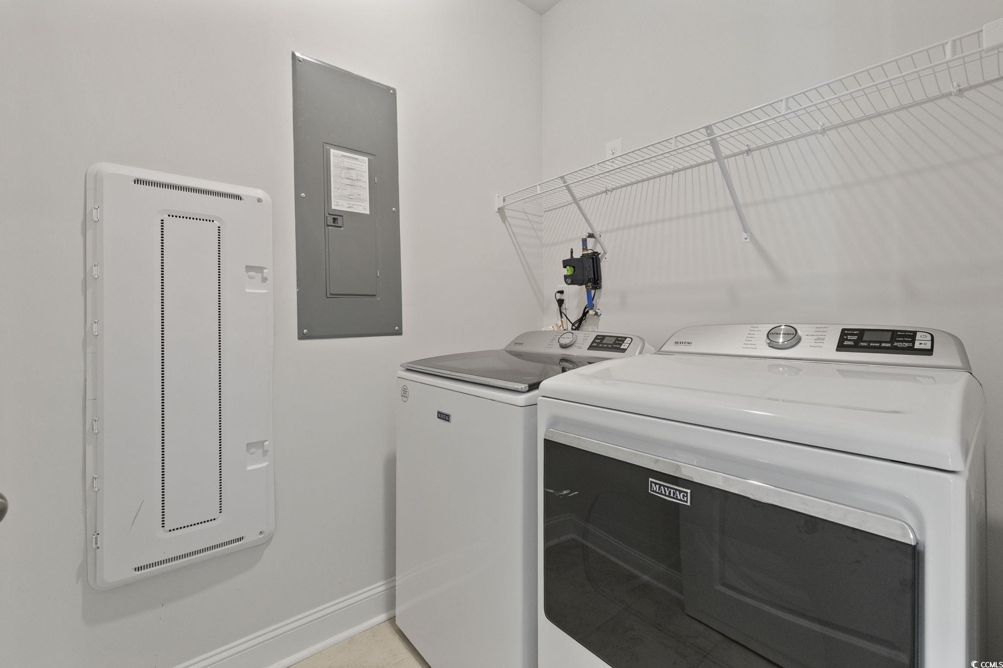 2595 Blue Crane Circle, Unit 102 Myrtle Beach, SC 29577 - Photo 13 of 40 Laundry room with electric panel and washing machine and dryer