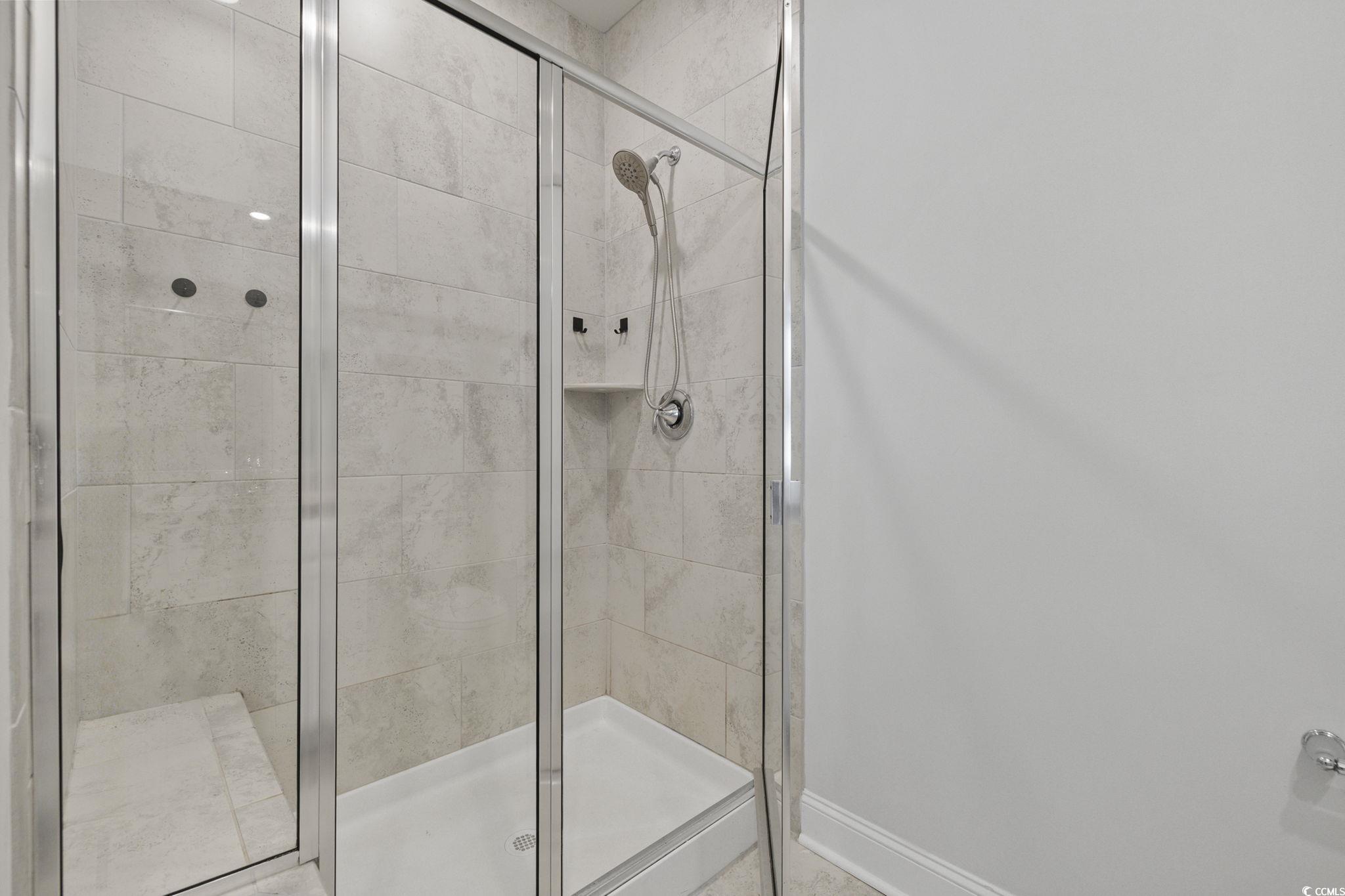 2595 Blue Crane Circle, Unit 102 Myrtle Beach, SC 29577 - Photo 20 of 40 Full bathroom with a shower stall