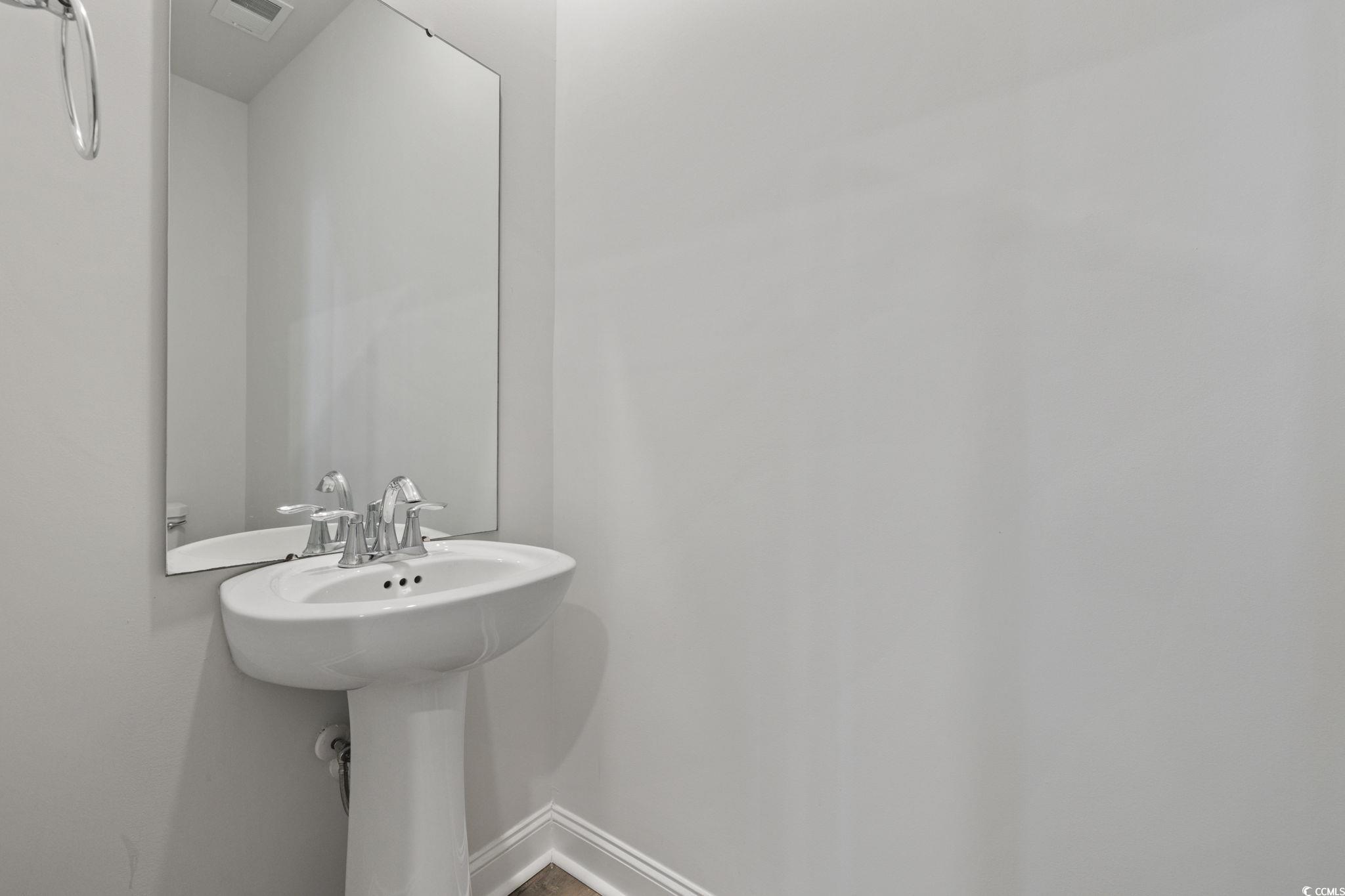 2595 Blue Crane Circle, Unit 102 Myrtle Beach, SC 29577 - Photo 21 of 40 Bathroom featuring baseboards