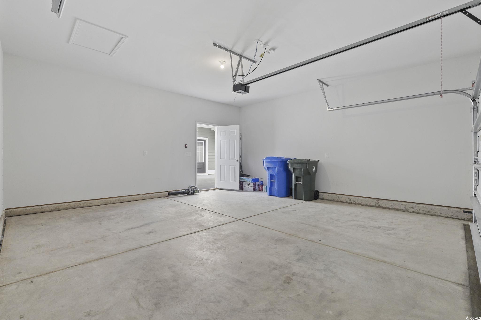 2595 Blue Crane Circle, Unit 102 Myrtle Beach, SC 29577 - Photo 35 of 40 View of garage