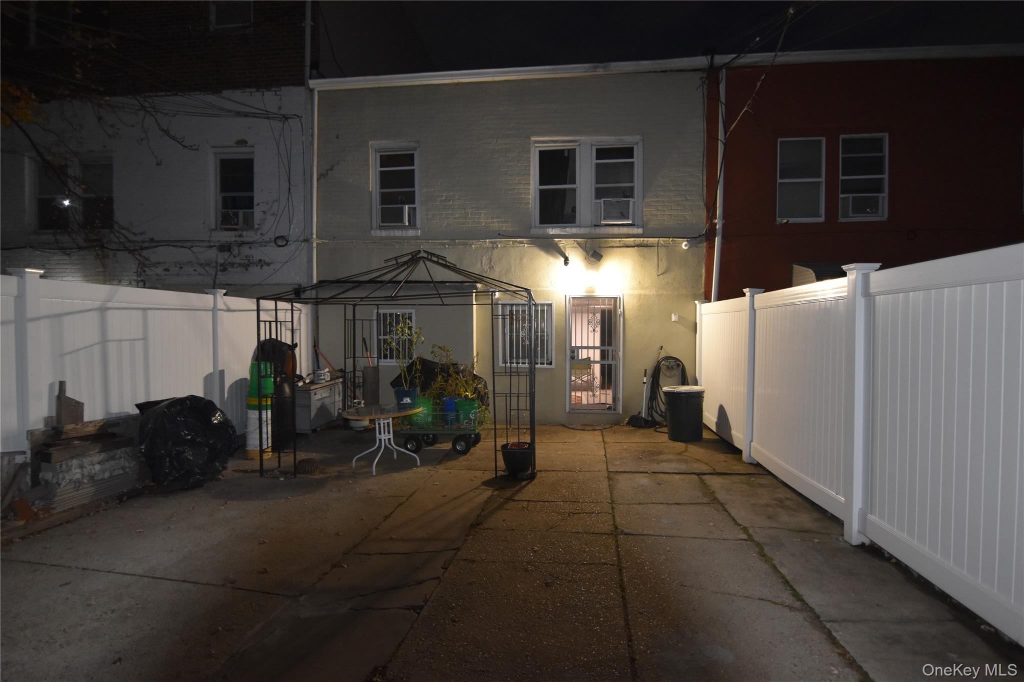 25-48 89th Street Queens, NY 11369 - Photo 14 of 17 a view of a chairs and tables in patio