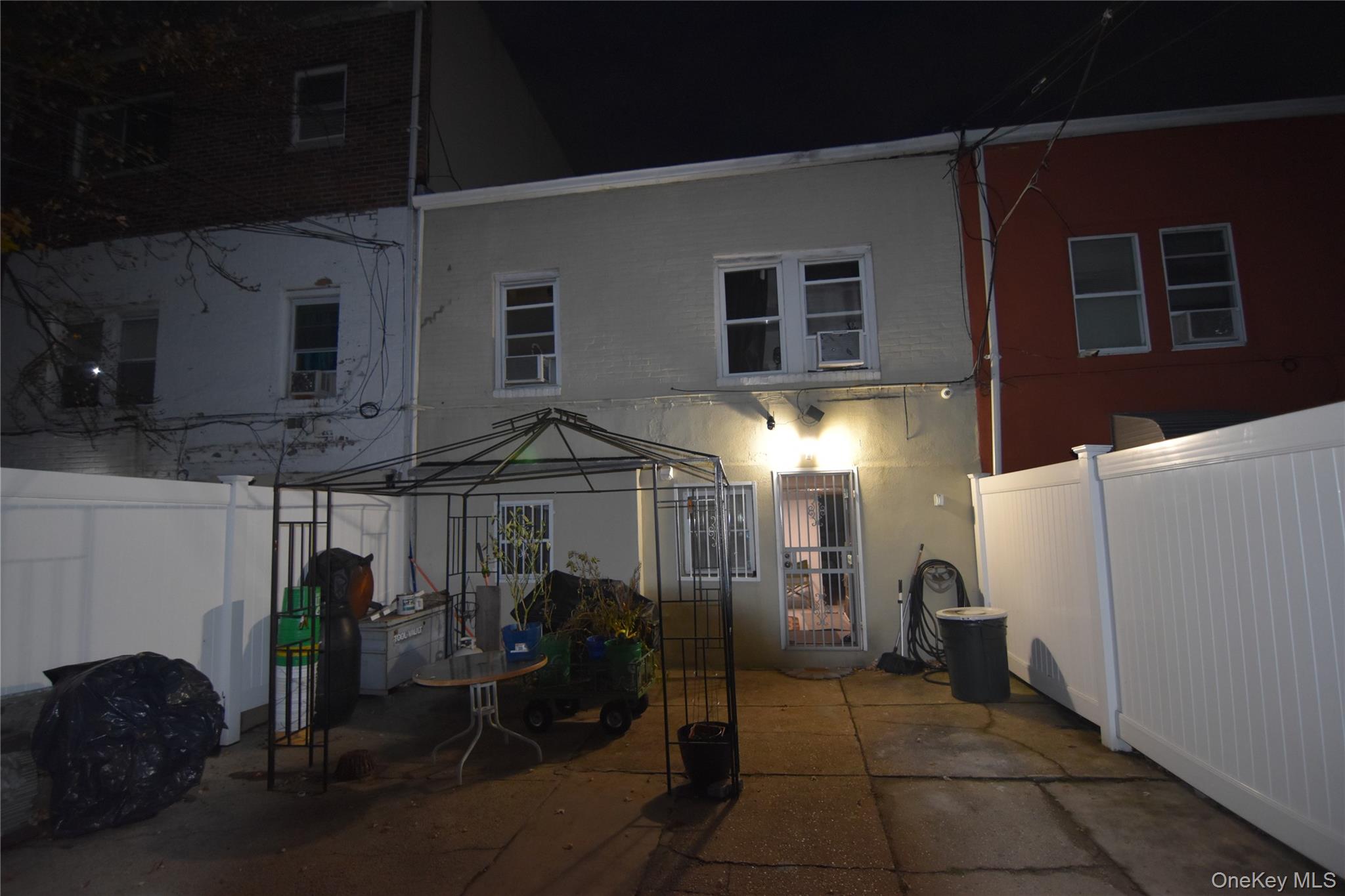 25-48 89th Street Queens, NY 11369 - Photo 15 of 17 a view of a house with entertaining space