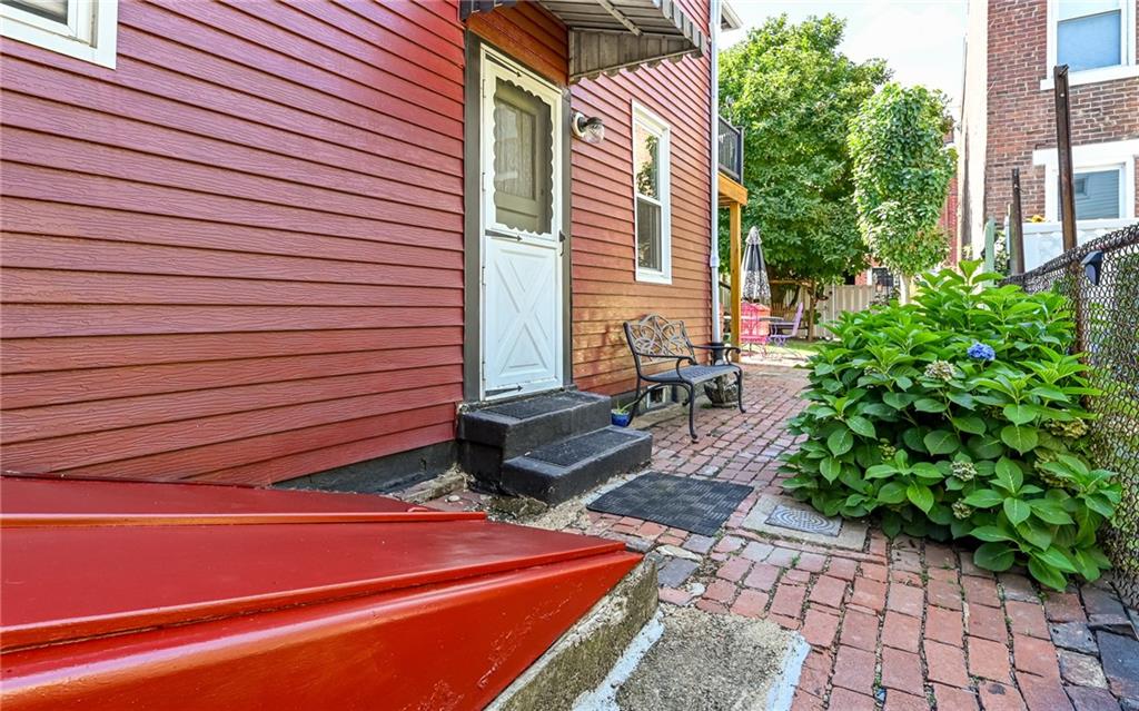 164 45th Street Pittsburgh, PA 15201 - Photo 31 of 47 a backyard of a house with outdoor seating