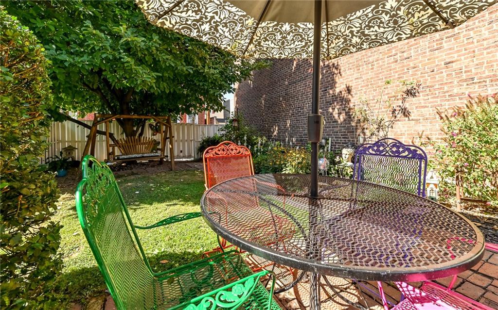 164 45th Street Pittsburgh, PA 15201 - Photo 36 of 47 a patio with water fountain and outdoor seating