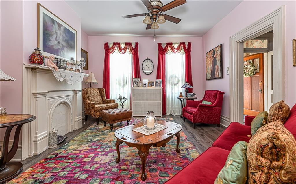 164 45th Street Pittsburgh, PA 15201 - Photo 9 of 47 a living room with furniture or couch and a window