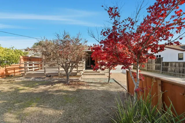 a view of swimming pool with a yard