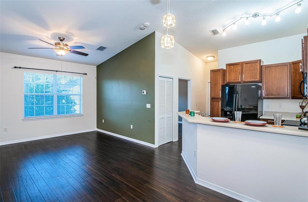 9013 Moonlit Meadows Loop Riverview, FL 33578 - Photo 20 of 43 a view of kitchen with sink microwave and refrigerator