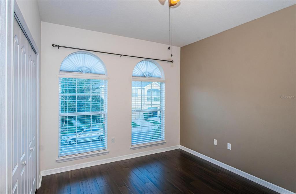 9013 Moonlit Meadows Loop Riverview, FL 33578 - Photo 25 of 43 a view of empty room with wooden floor and fan