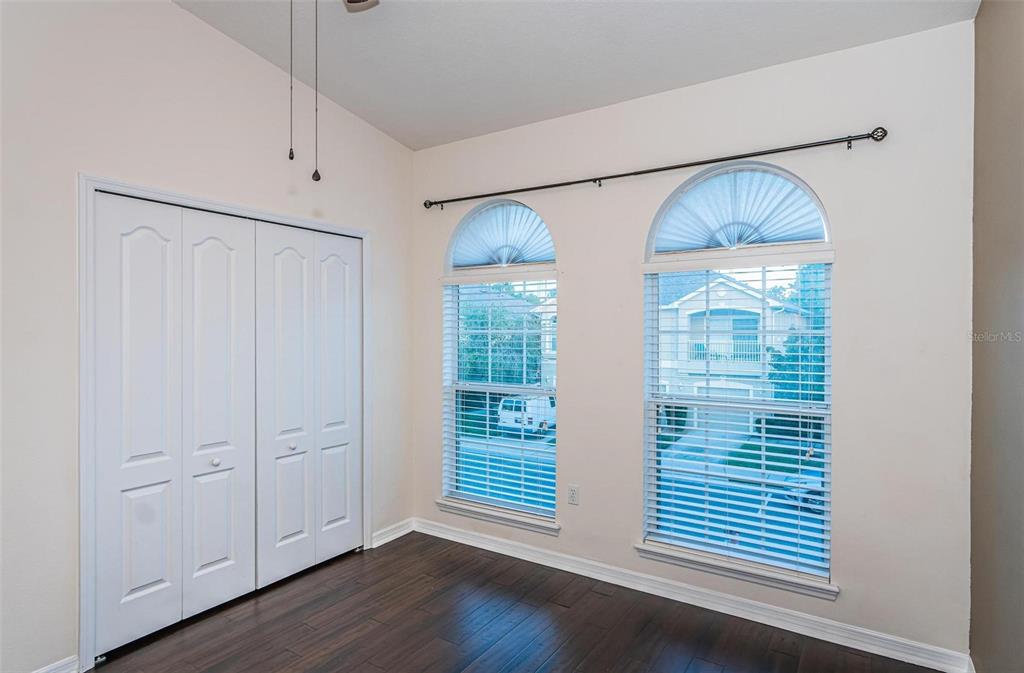 9013 Moonlit Meadows Loop Riverview, FL 33578 - Photo 26 of 43 a view of wooden floor and windows in a room