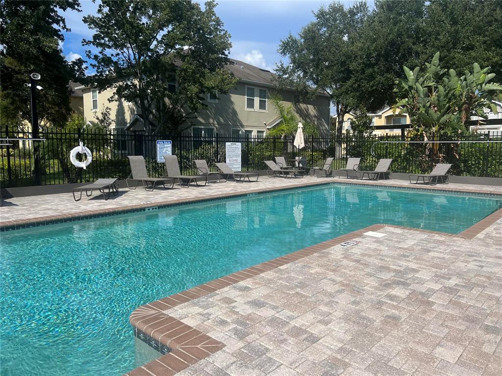 9013 Moonlit Meadows Loop Riverview, FL 33578 - Photo 41 of 43 a view of a house with backyard and sitting area
