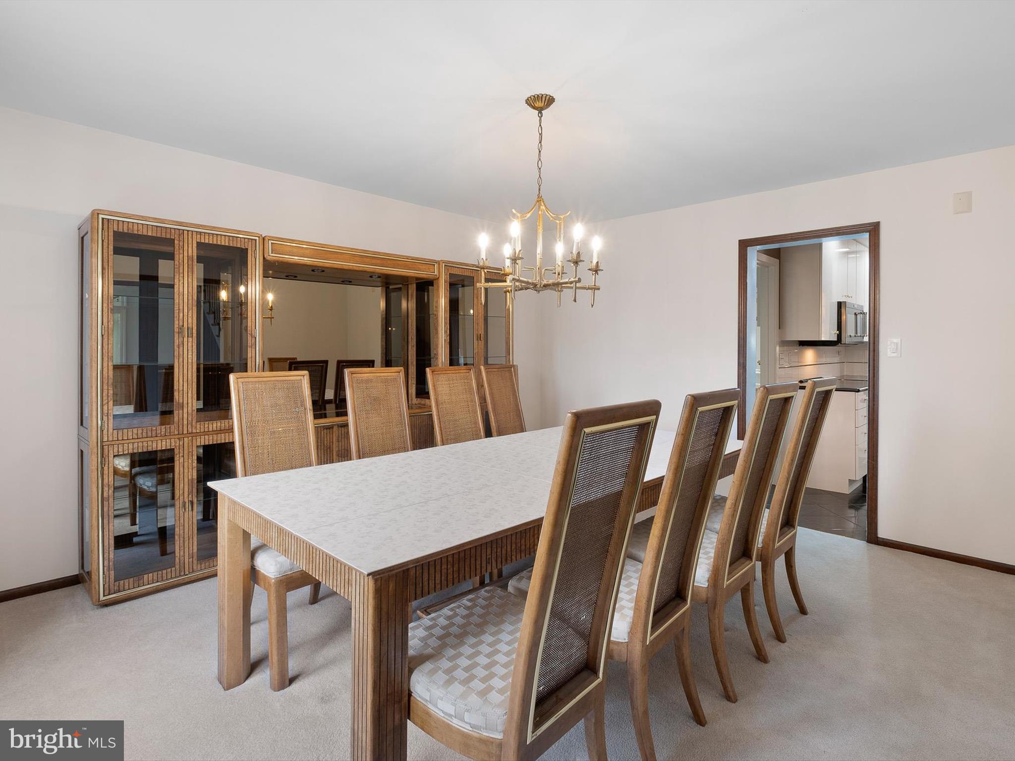 2 Windy Road Wilmington, DE 19810 - Photo 11 of 49 a view of a dining room with furniture and wooden floor