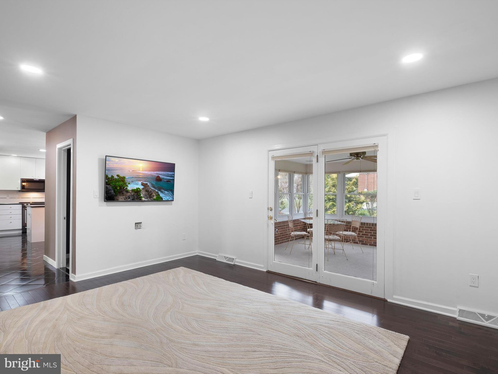 2 Windy Road Wilmington, DE 19810 - Photo 17 of 49 a view of a livingroom with wooden floor and windows